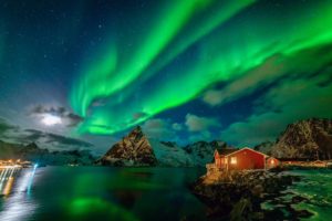 Northern Lights over the fjord Norway - Lofoten Islands